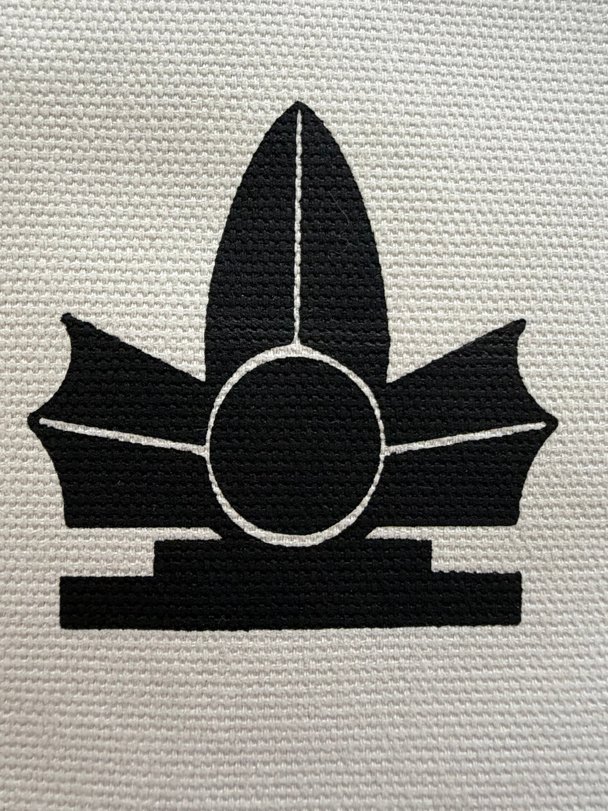 Close-up of printed shield design on the Taido dogi tote bag
